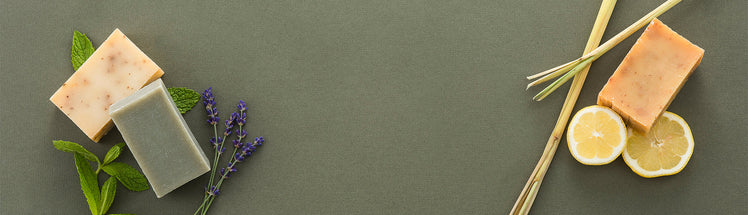 Saje soap bars placed with lemon, mint and lavender