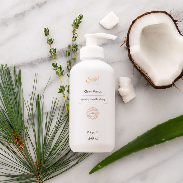 Clean Hands Liquid Hand Soap bottle with its ingredients on a white marble surface